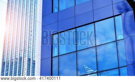 Downtown Corporate Business District Architecture. Glass Reflective Office Buildings Against Blue Sk