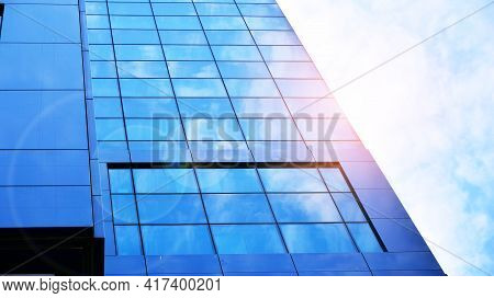 Downtown Corporate Business District Architecture. Glass Reflective Office Buildings Against Blue Sk