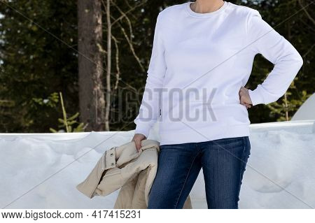 White Fleece Crewneck Sweatshirt Mockup Featuring A Woman With Asymmetrical Hairstyle In The Winter 