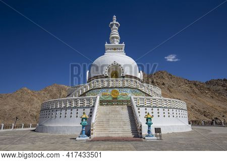 White Buddhist Stupa Or Pagoda In Tibetan Monastery Near Village Leh In Ladakh Region, Noth India