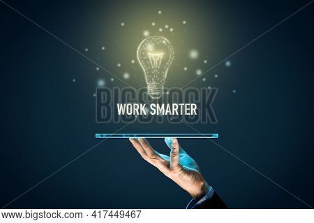 Work Smarter Concept With Digital Tablet And Light Bulb In Pcb Design. Digitization And Digitalizati