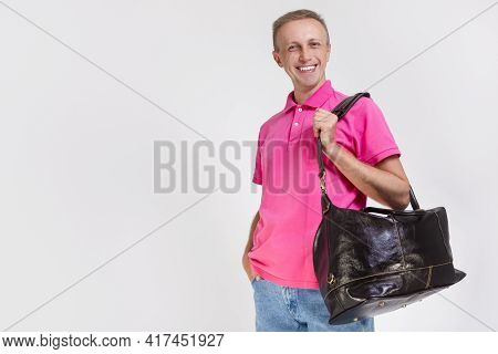 Modern Lifestyle Concepts. Portarit Of Positive Smiling Caucasian Handsome Man Posing With Leather T