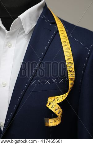 Semi-ready Jacket With Tailor's Measuring Tape On Mannequin, Closeup