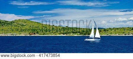 Sailing Ship In Front Of Kornati Islands Of Croatia