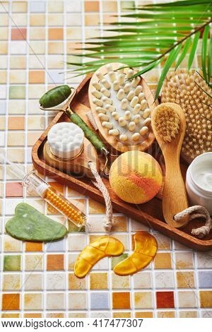 Jars Of Cream For Face And Body Care, Gold Eye Patches And Serum With Gold, Jade Roller Massager Gau