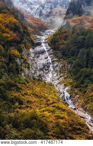 Ayder Plateau Natural Gelintulu Waterfall Surrounded By Autumn Colors Near Rize, Turkey.