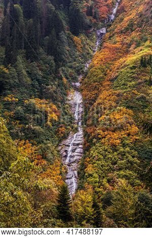 Ayder Plateau Natural Gelintulu Waterfall Surrounded By Autumn Colors Near Rize, Turkey.