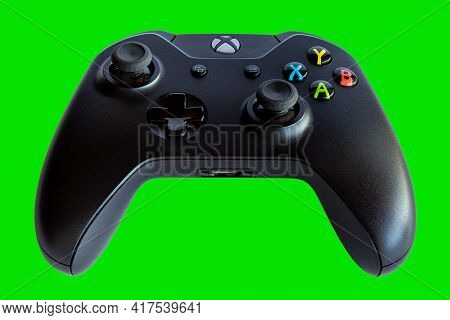 Rio De Janeiro, Brazil - April 19, 2021: Xbox Video Game Controller A Microsoft Gamepad. Green Backg