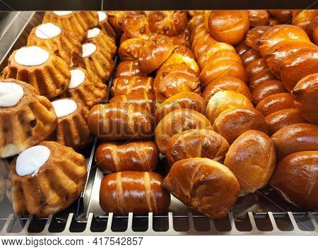 Sweet Bakery Products On The Shop Window.