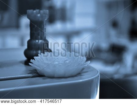 Abstract Isolated Object Flower Of A Yellow Color Printed On A 3d Printer