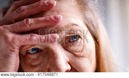 Portrait Of Lonely Old Woman Thinking About Life. High Quality Photo