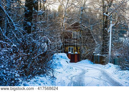 Country winter landscape with the image of village