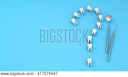 Teeth In The Form Of A Question Mark. Concept Of How To Care For And Treat Teeth. Tooth With A Denta