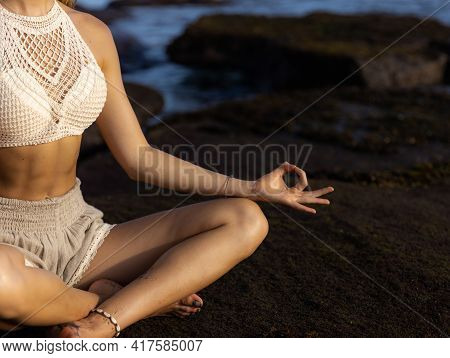 Close Up Gyan Mudra. Lotus Pose, Padmasana. Focus On Fingers. Yoga On The Beach. Woman Sitting On Th