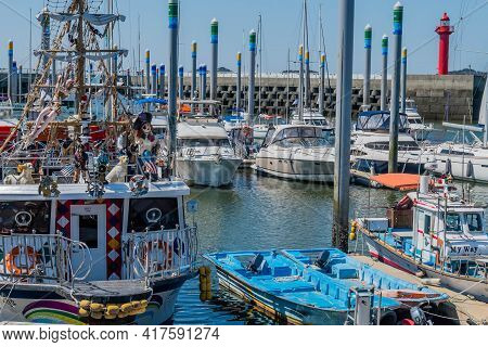 Pyeontaek, South Korea; April 14, 2021: Tour Boats And Personal Yachts Moored In Berths At Jeongok M