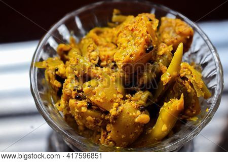 Stock Photo Of Fresh Lime Chilli Mix Pickle Kept In Glass Bowl Under Natural Light, Delicious Testy 