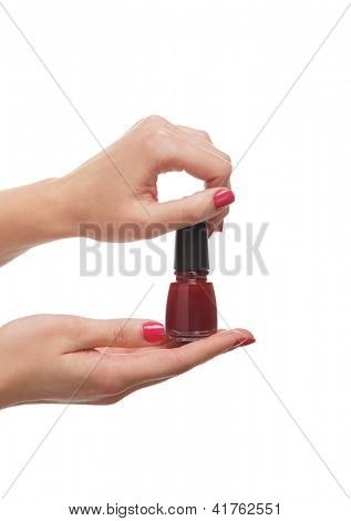 Belle mani femminile con la manicure polich isolata on white