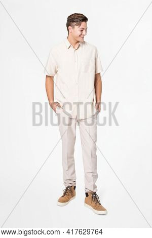 Man in beige shirt and pants casual wear fashion full body
