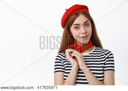 Tender Young Woman Looking With Cute And Lovely Face At Camera, Wearing Berret And Striped T-shirt, 