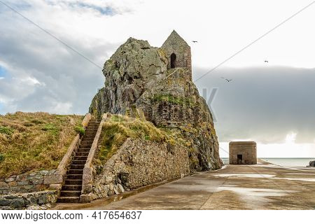 Saint Helier Hermitage Site With Medieval Chapel On Top With German Ww2 Bunker In The Background, Ba