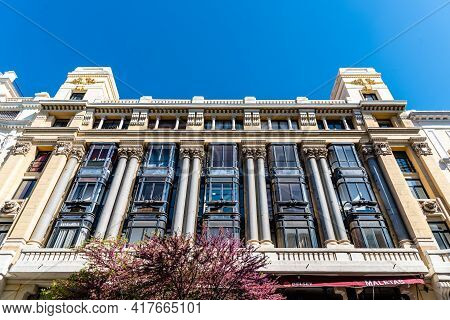 Madrid, Spain - April, 18 2021: Low Angle View Of Old Office Building In Mayor Street In Central Mad