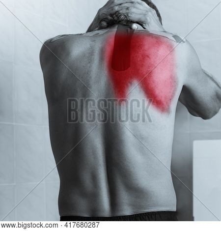 Black And White Photo Of Shirtless Sick Man Touching His Back