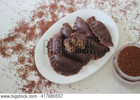 Steamed Dumplings Made From Finger Millet Flour. It Is Stuffed With Coconut And Jaggery To Make It S