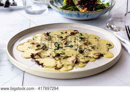 The Traditional Italian Dish Vitello Tonato Is On The Plate.