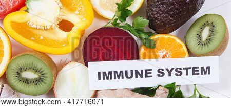 Inscription Immune System, Fresh Ripe Healthy Fruits And Vegetables Containing Natural Vitamins. Imm