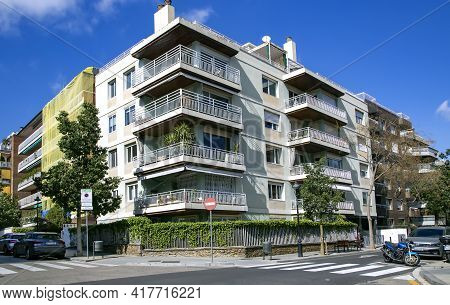 Spain, Barcelona, March, 2021: Modern Multi-storey Architecture With Good Urban Greening In Quiet Of