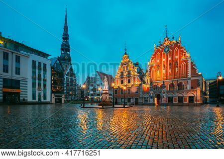 Riga, Latvia - July 1, 2016: Scenic Town Hall Square With St. Peters Church, Schwabe House, House Of