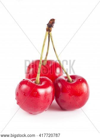 Ripe Fresh Red Cherry Isolated On White Background. With Clipping Path.