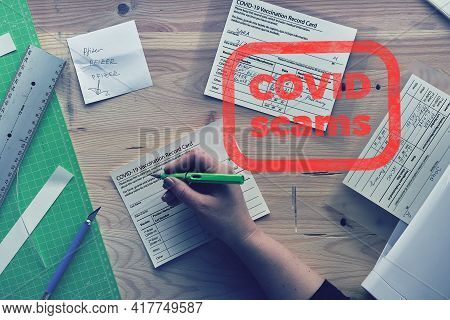 Covid Scams. Fake Covid Vaccination Record Card. Forgery Of Health Certificate With False Vaccinatio