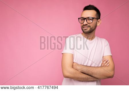Handsome Young Happy Brunet Unshaven Man Wearing White T-shirt For Mockup And Stylish Optical Glasse