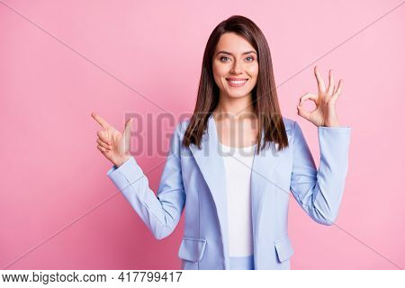 Photo Of Young Happy Smiling Beautiful Businesswoman Showing Ok Sign Point Finger Copyspace Isolated
