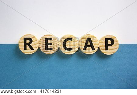 Recap Symbol. Wooden Circles With Word 'recap' On Beautiful White And Blue Background, Copy Space. B