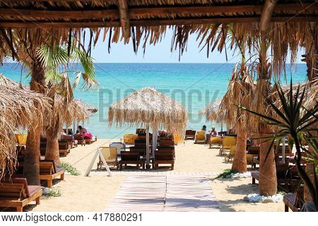 Popular Greece Beach - Ammolofoi. View Of The Beach On The Aegean Coast. Nea Peramos, Kavala, Northe