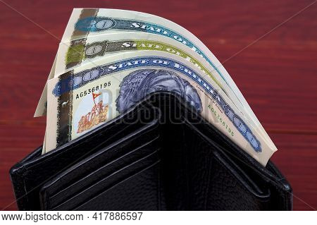 Eritrean Money - Nakfa In A Black Wallet
