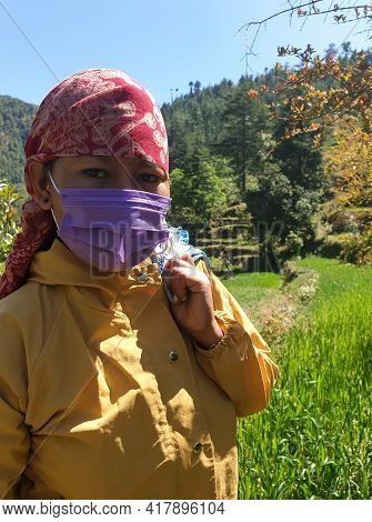 Closeup Shot Of An Indian Young Woman Which Wearing Dhatu (himachal Fashion Accessory) And Face Mask