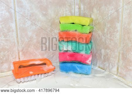 Sponge With Washing Brus And Detergent During Cleaning Bathroom Or Toilet. Washing Dishes And Plumbi