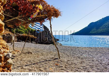 Sea And Sandy Vlychada Beach At Sunny Day. Tranquil Scene. Dyllic Relaxation Place In Greece.