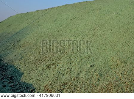 Stabilization Of Slopes By Hydro Sowing. A Mixture Of Wood Pulp And Green Grass Seed Is Sprayed From