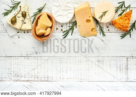 Set Or Assortment Cheeses. Suluguni With Spice, Camembert, Blue Cheese, Parmesan, Maasdam, Brie Chee