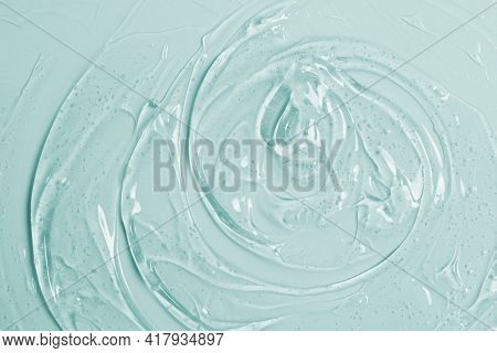 Abstract Cosmetic Background From Transparent Gel Or Antiseptic, Hyaluron