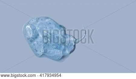 Thick Transparent Gel, Cosmetic: Soap Texture, Antiseptic, Hyaluron Isolated On Blue Top View