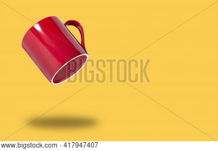 Flying Red Cup Or Mug For Coffee Or Tea On Yellow Isolated, Concept Banner For Coffee Shop Or Restau