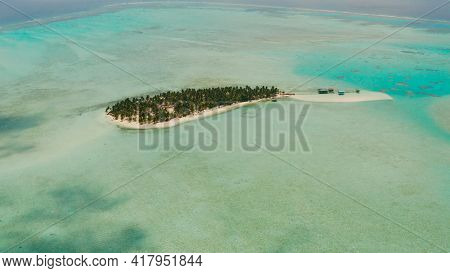 Tropical Island In The Ocean With Palm Trees On White Sand Beach. Onok Island, Balabac, Philippines.