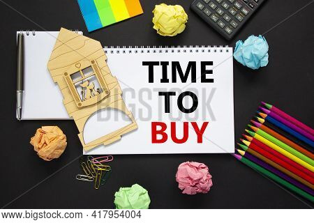 Time To Buy Real Estate Symbol. White Note With Words 'time To Buy' On Beautiful Black Background, M