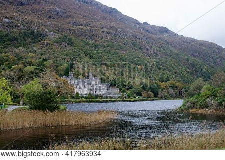 Kylemore Abbey, Home To The Sisters Of The Benedictine Order In Ireland. Duchruach Mountain, On The 