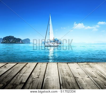 yacht and wooden platform